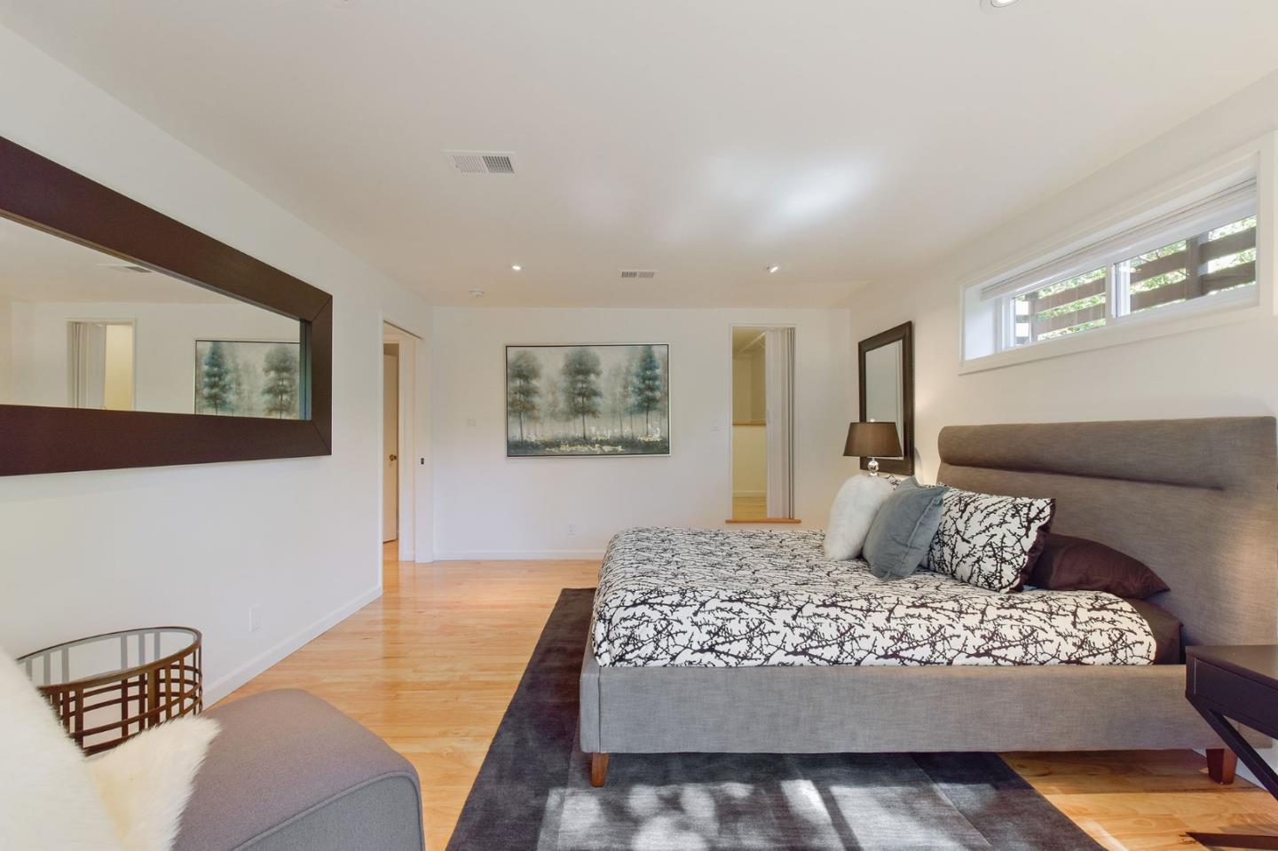 39 Colorados Drive Millbrae, CA 94030 - Photo 34 of 49 a bedroom with a large bed and a couch