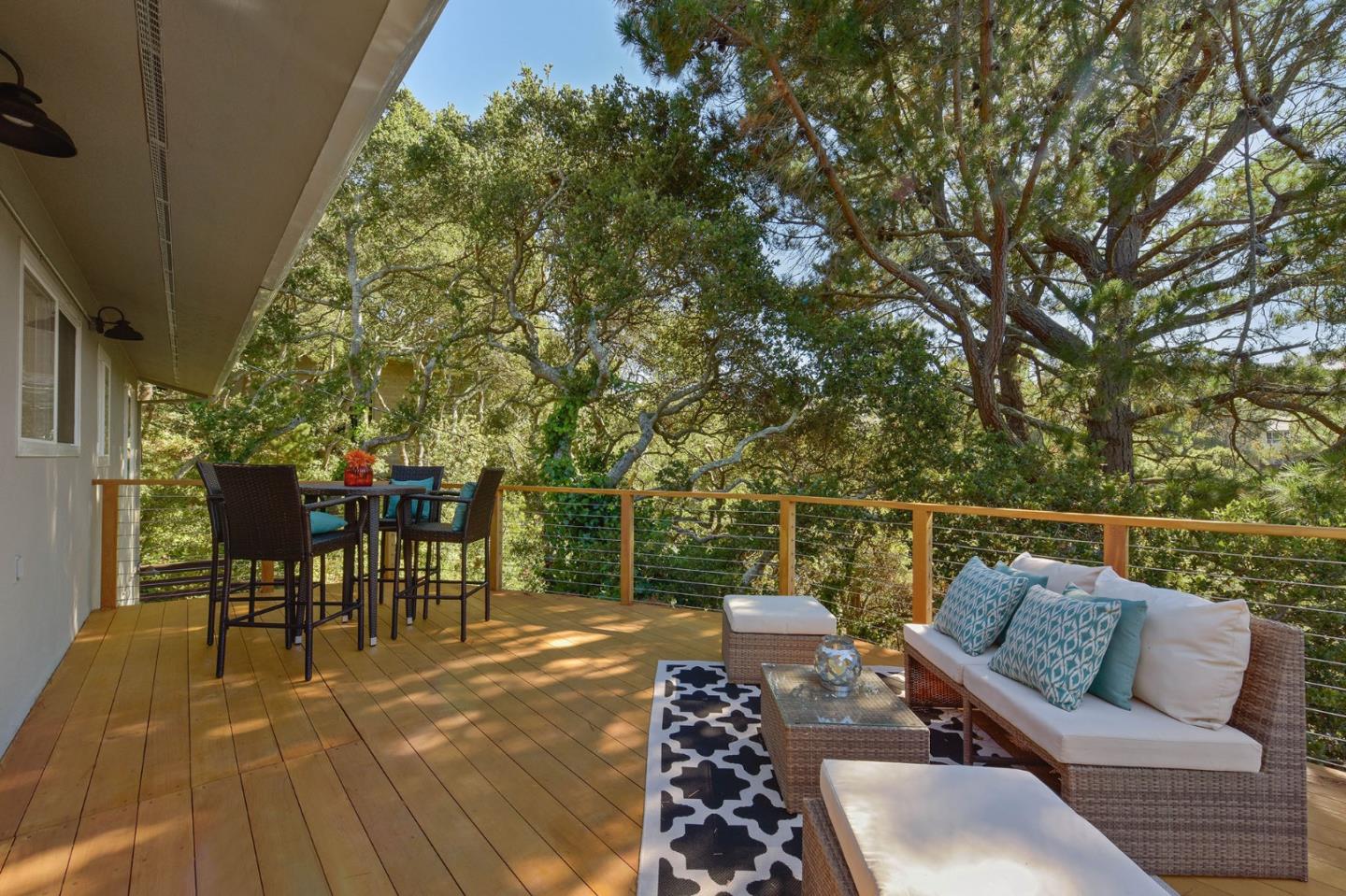 39 Colorados Drive Millbrae, CA 94030 - Photo 40 of 49 a balcony with furniture and potted plants