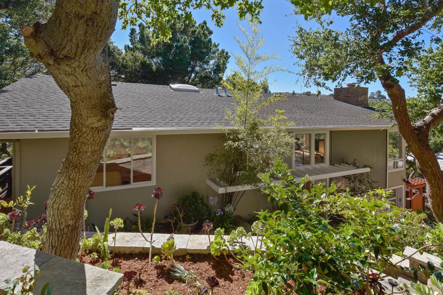 39 Colorados Drive Millbrae, CA 94030 - Photo 48 of 49 front view of a house with a tree