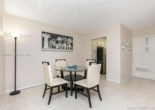 a view of a dining room with furniture