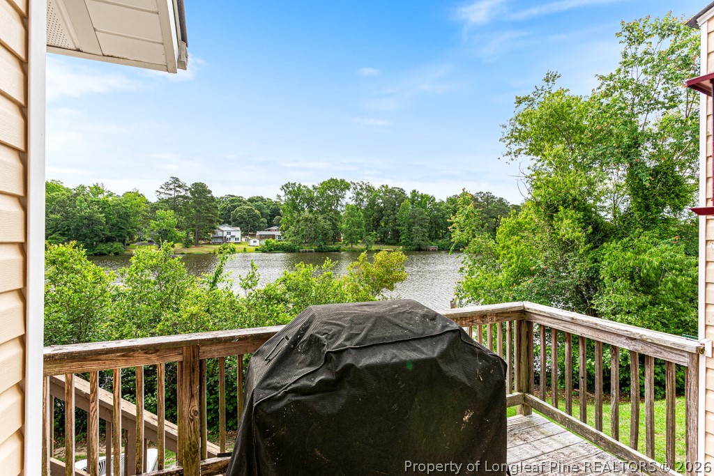 461 Lands End Road Fayetteville, NC 28314 - Photo 31 of 31 a view of a wooden deck with lake view
