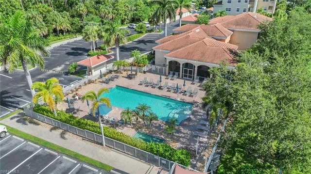 a aerial view of a house with a garden and plants