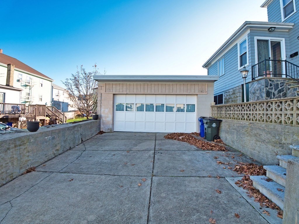 40 Howard Street Fall River, MA 02721 - Photo 5 of 31 a view of a house with a street