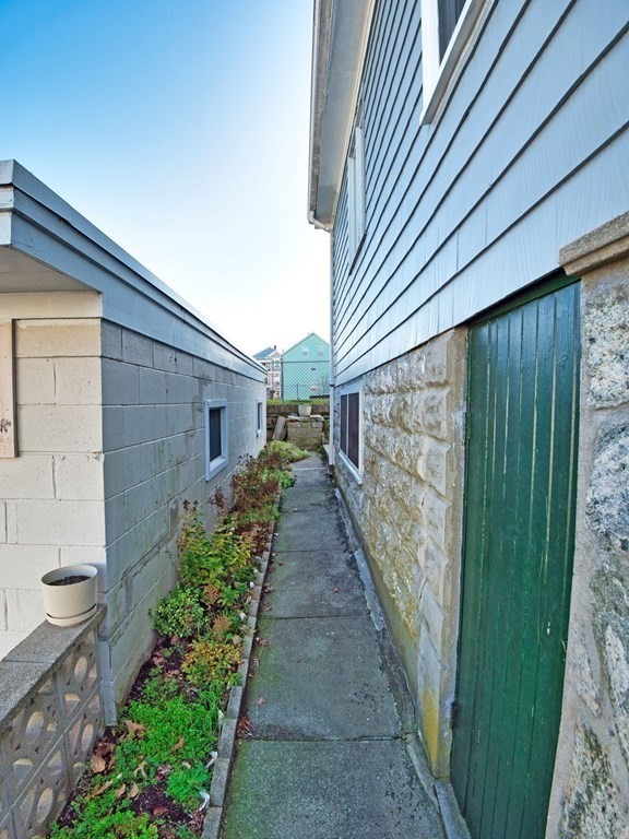 40 Howard Street Fall River, MA 02721 - Photo 8 of 31 a view of a pathway with a house