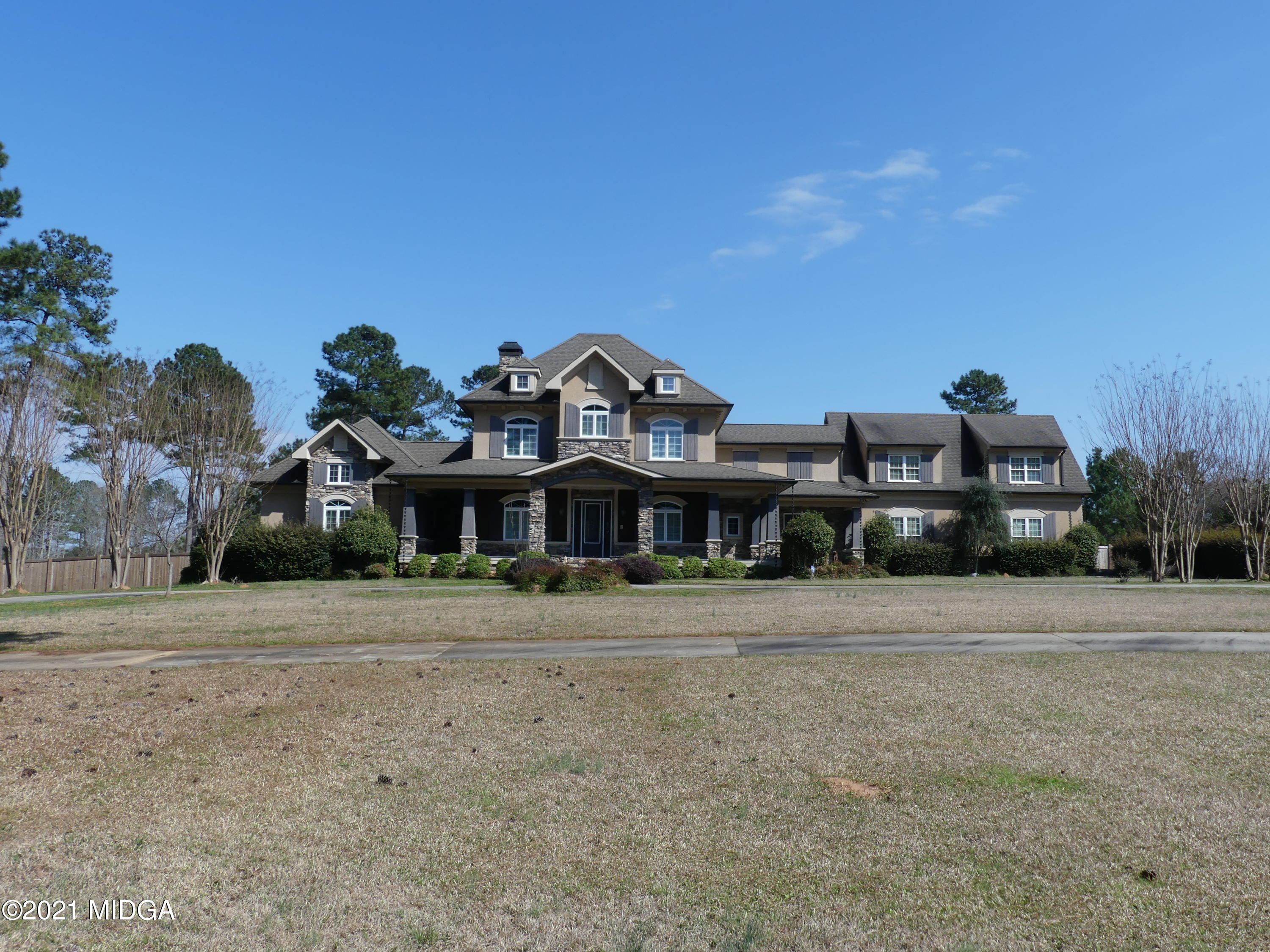 1616 Wadley Road Macon, GA 31220 - Photo 2 of 56 a front view of a house with a yard