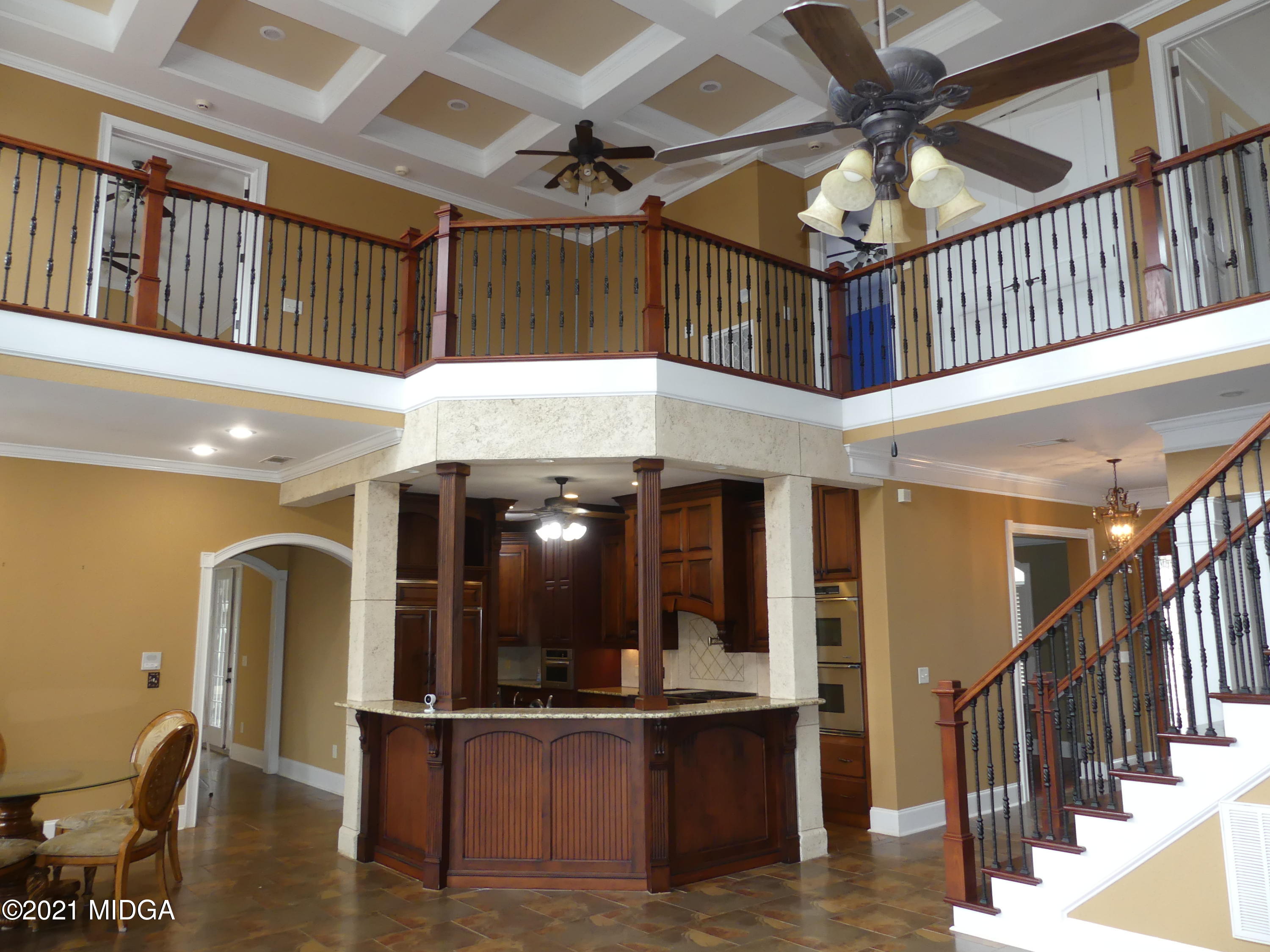 1616 Wadley Road Macon, GA 31220 - Photo 14 of 56 a view of living room with furniture and a chandelier