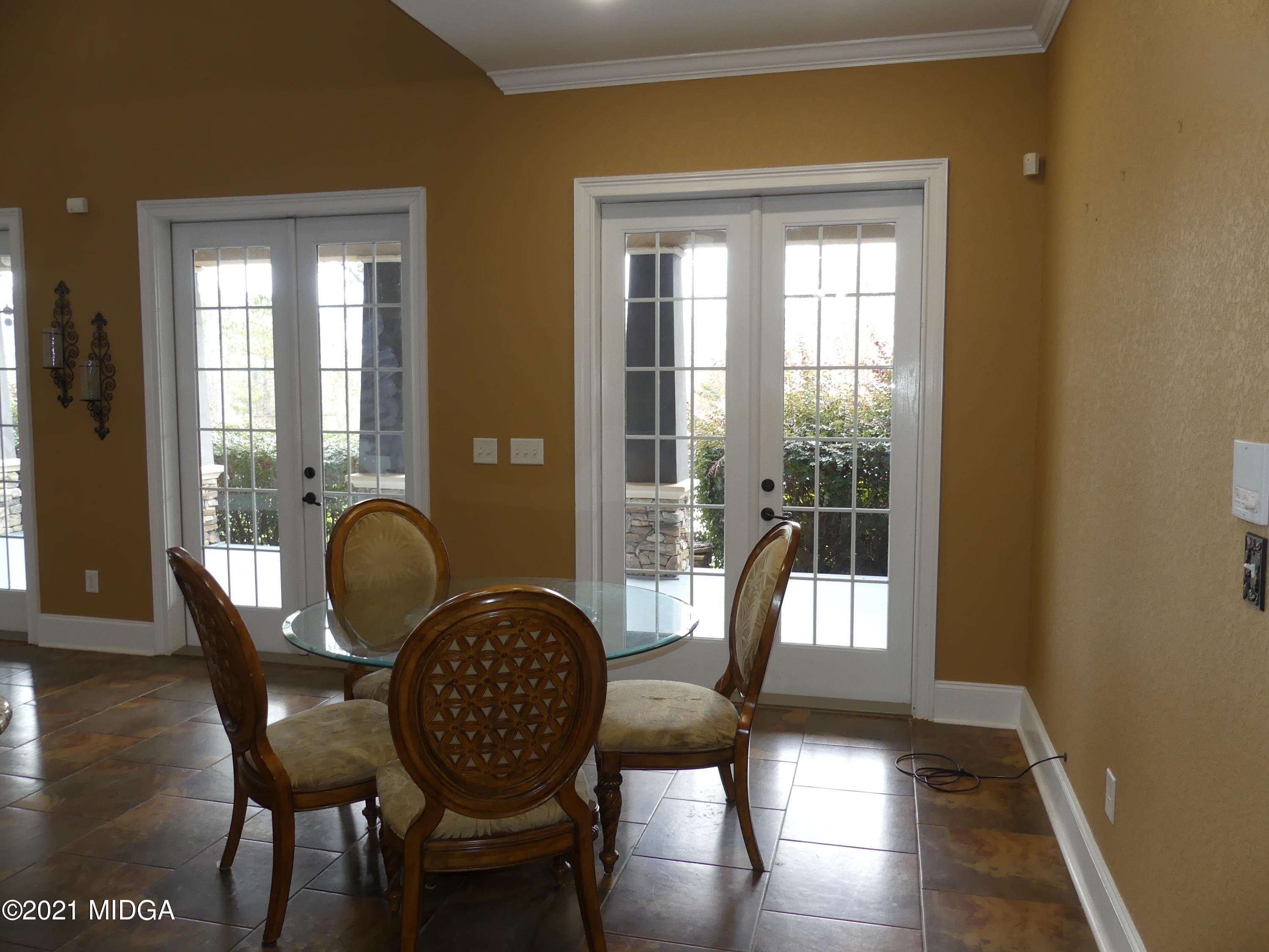 1616 Wadley Road Macon, GA 31220 - Photo 15 of 56 a view of a dining room with furniture window and wooden floor