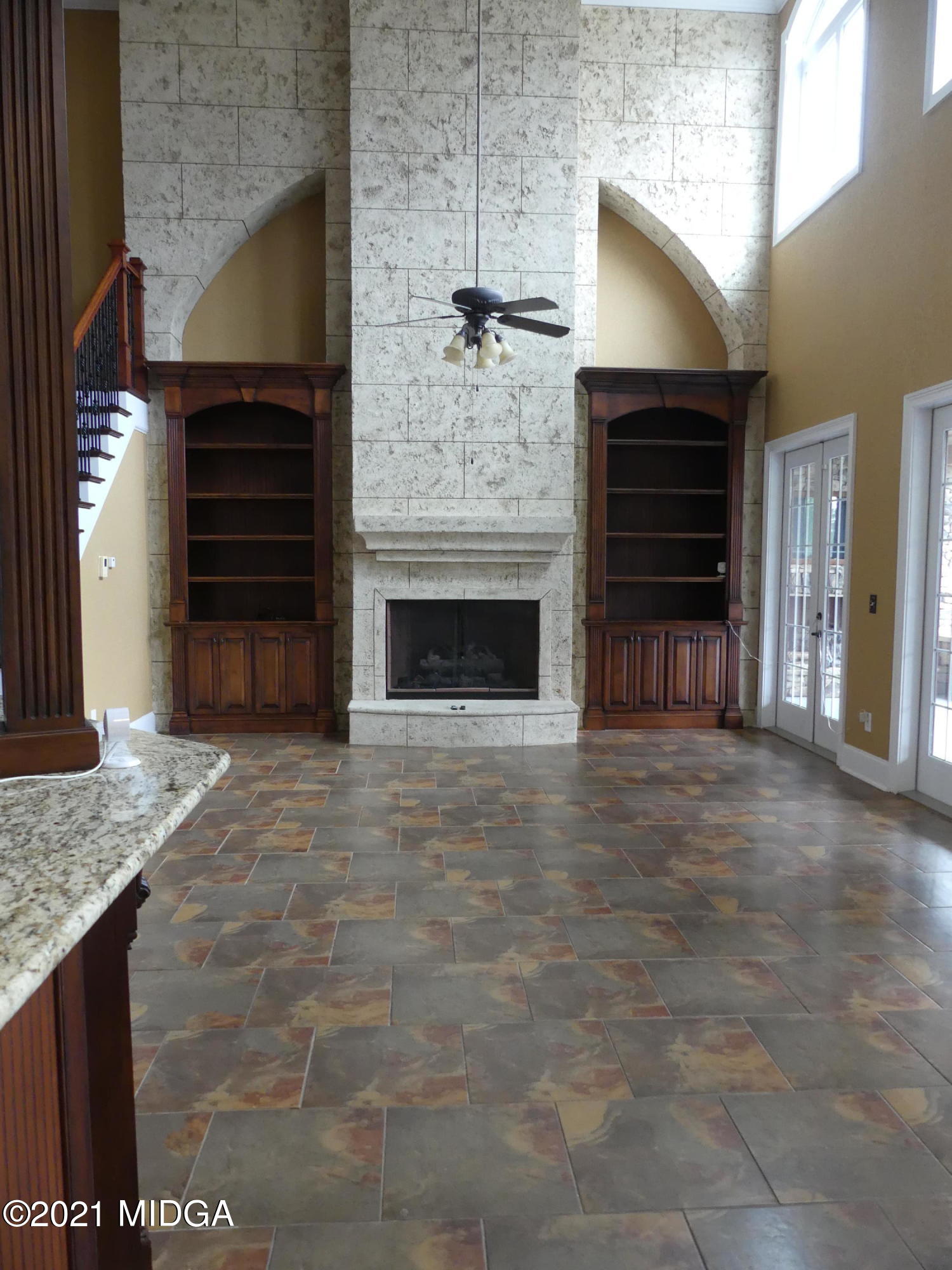 1616 Wadley Road Macon, GA 31220 - Photo 16 of 56 a view of an empty room with a fireplace