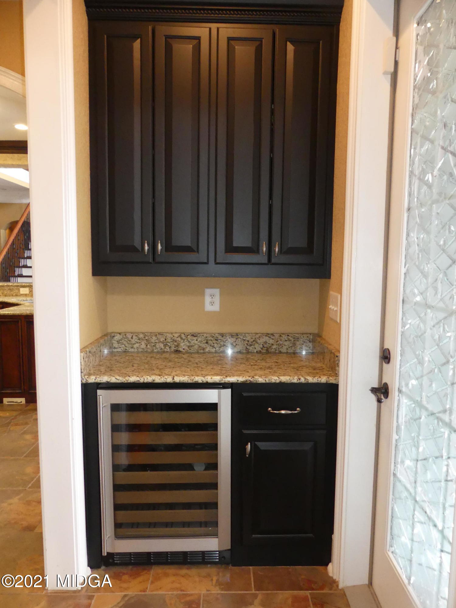 1616 Wadley Road Macon, GA 31220 - Photo 21 of 56 a view of a kitchen with granite countertop wooden cabinets