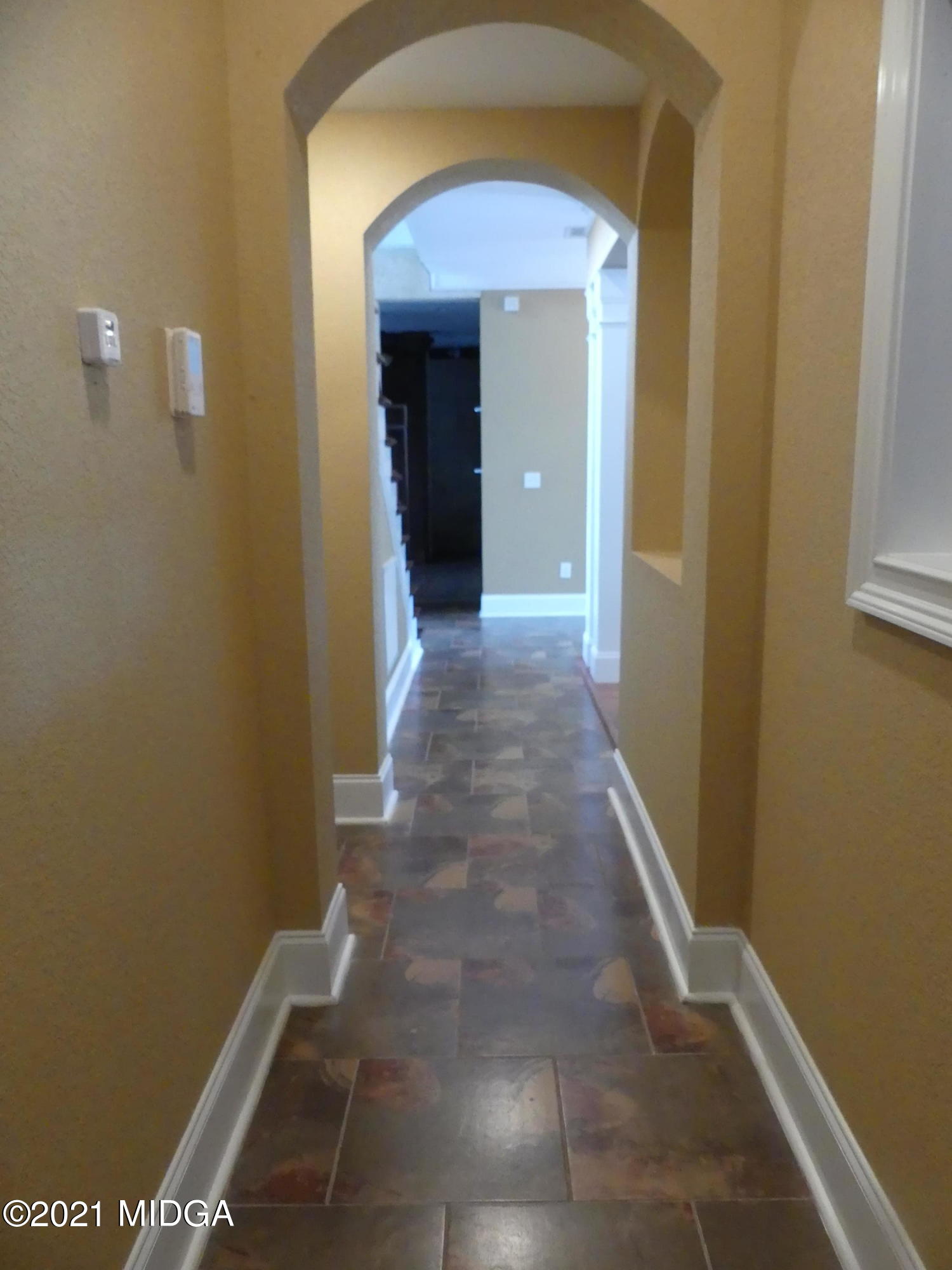 1616 Wadley Road Macon, GA 31220 - Photo 22 of 56 a view of a hallway with wooden floor