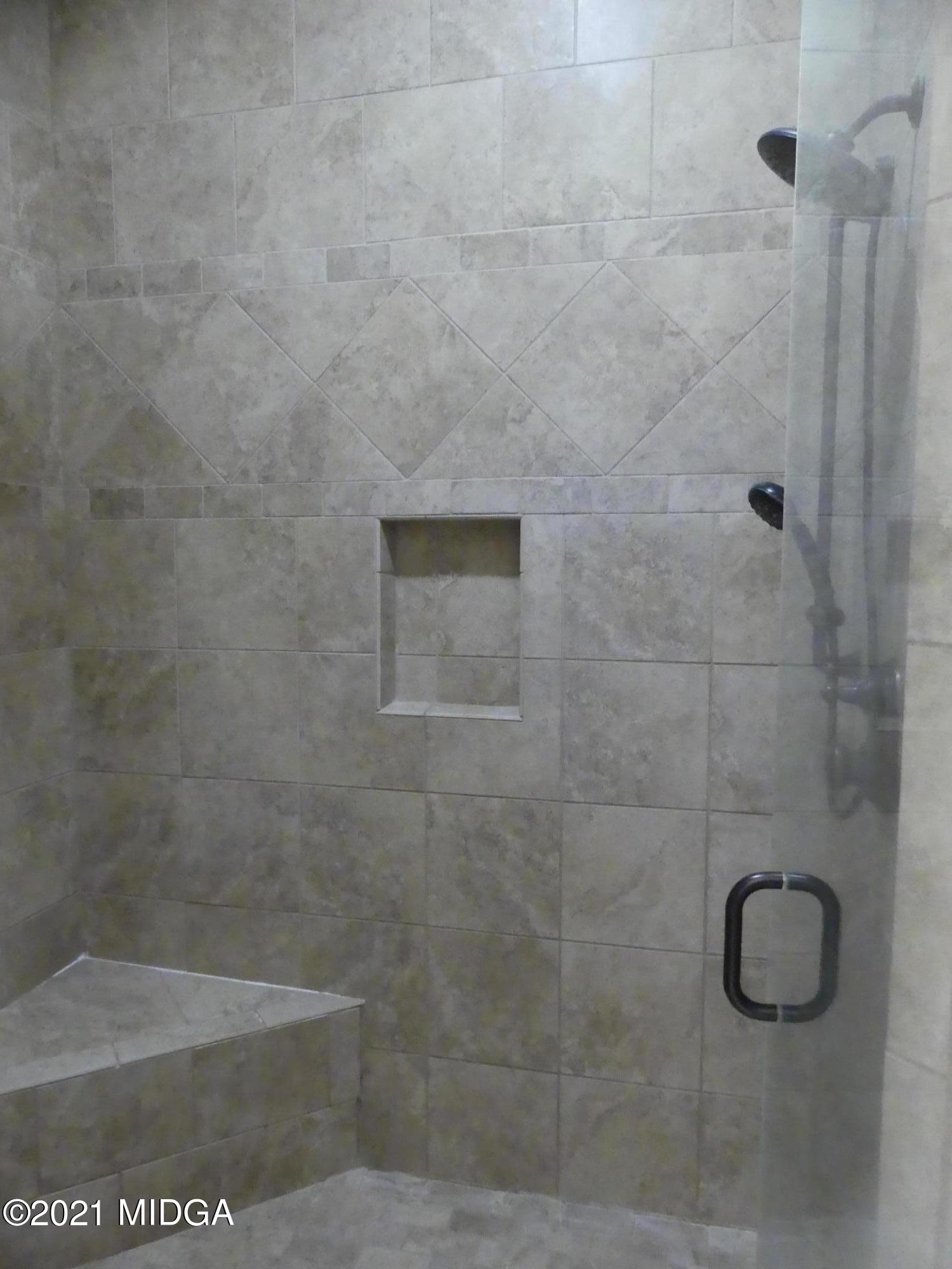 1616 Wadley Road Macon, GA 31220 - Photo 28 of 56 a bathroom with a shower