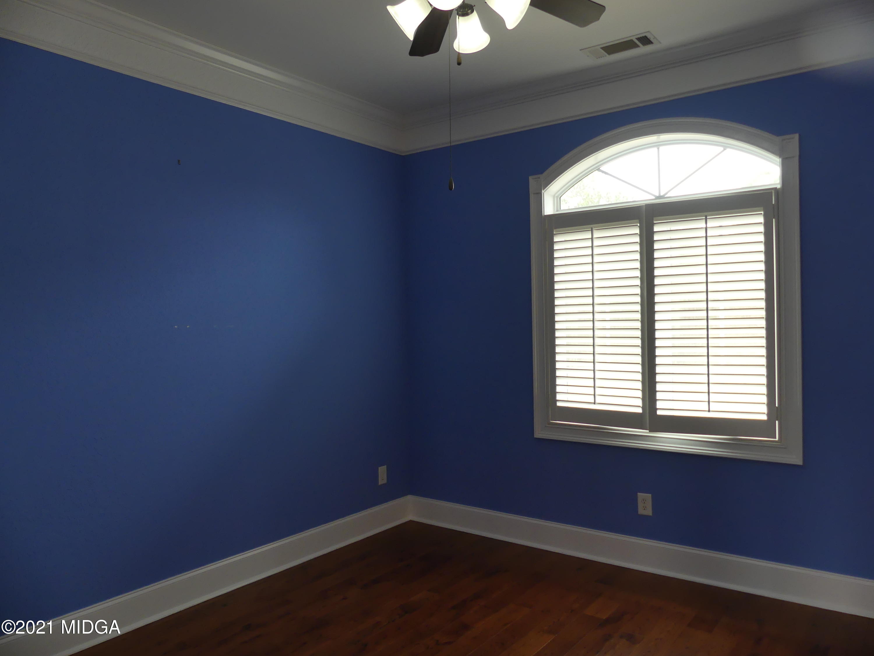1616 Wadley Road Macon, GA 31220 - Photo 32 of 56 an empty room with a window
