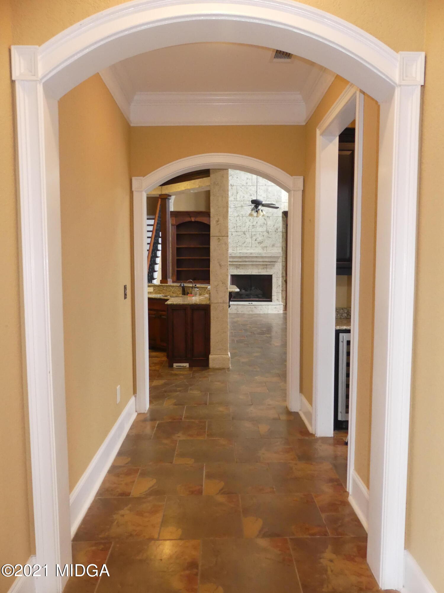 1616 Wadley Road Macon, GA 31220 - Photo 36 of 56 a view of a hallway with wooden shelves