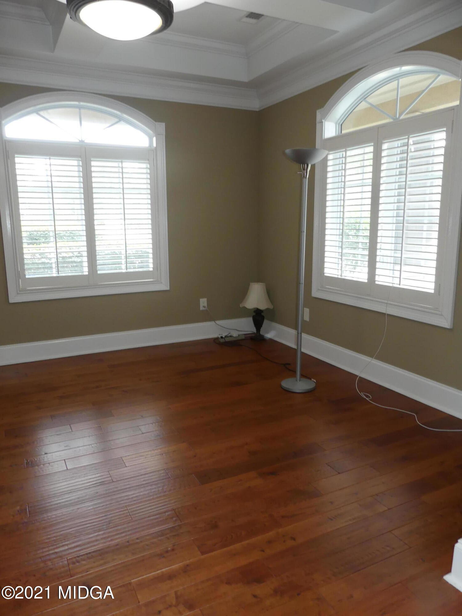 1616 Wadley Road Macon, GA 31220 - Photo 5 of 56 a view of a room with wooden floor and a window