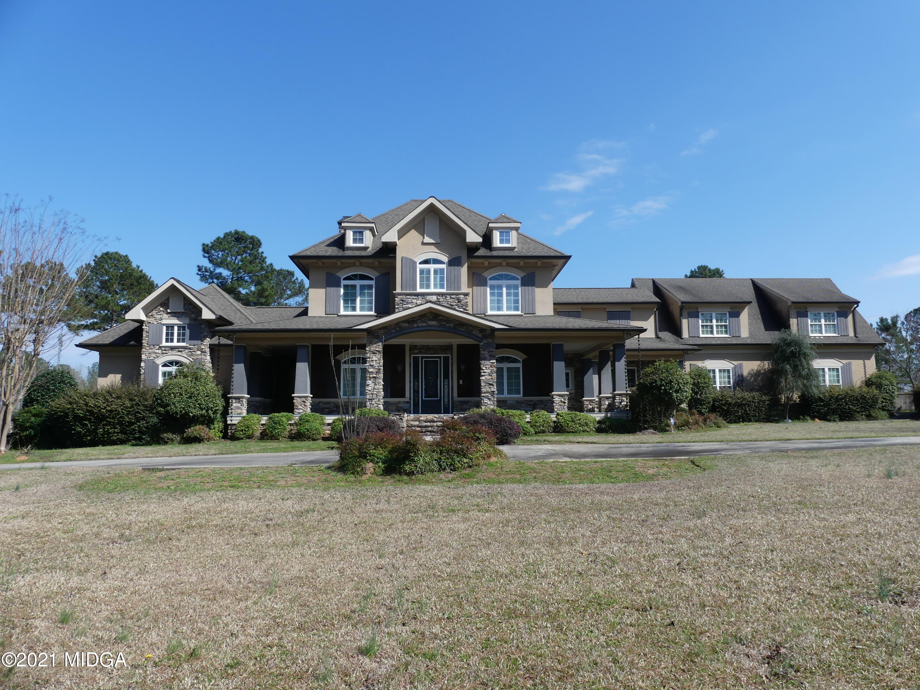 1616 Wadley Road Macon, GA 31220 - Photo 55 of 56 a front view of a house with a yard