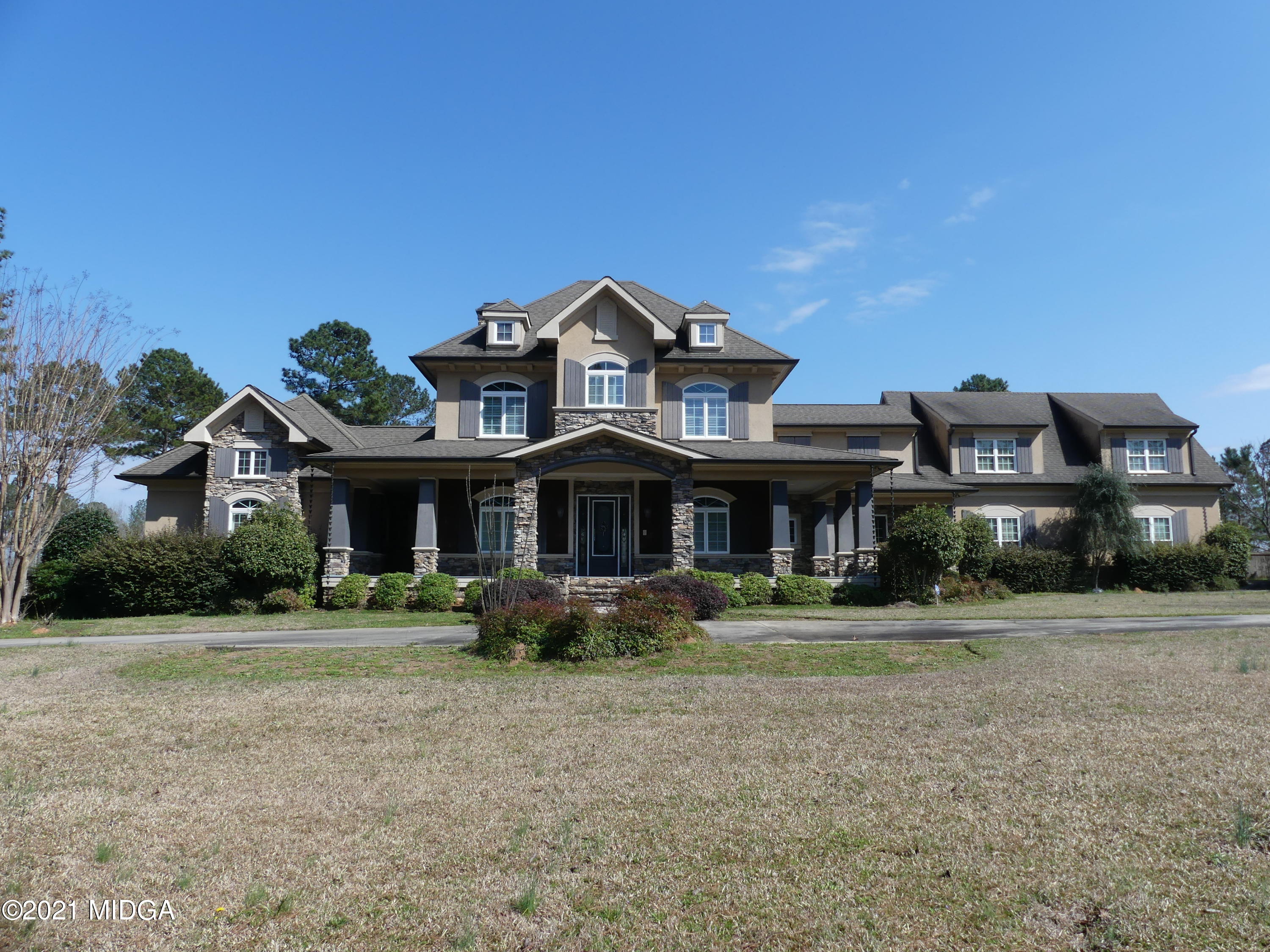 1616 Wadley Road Macon, GA 31220 - Photo 56 of 56 a front view of a house with a yard