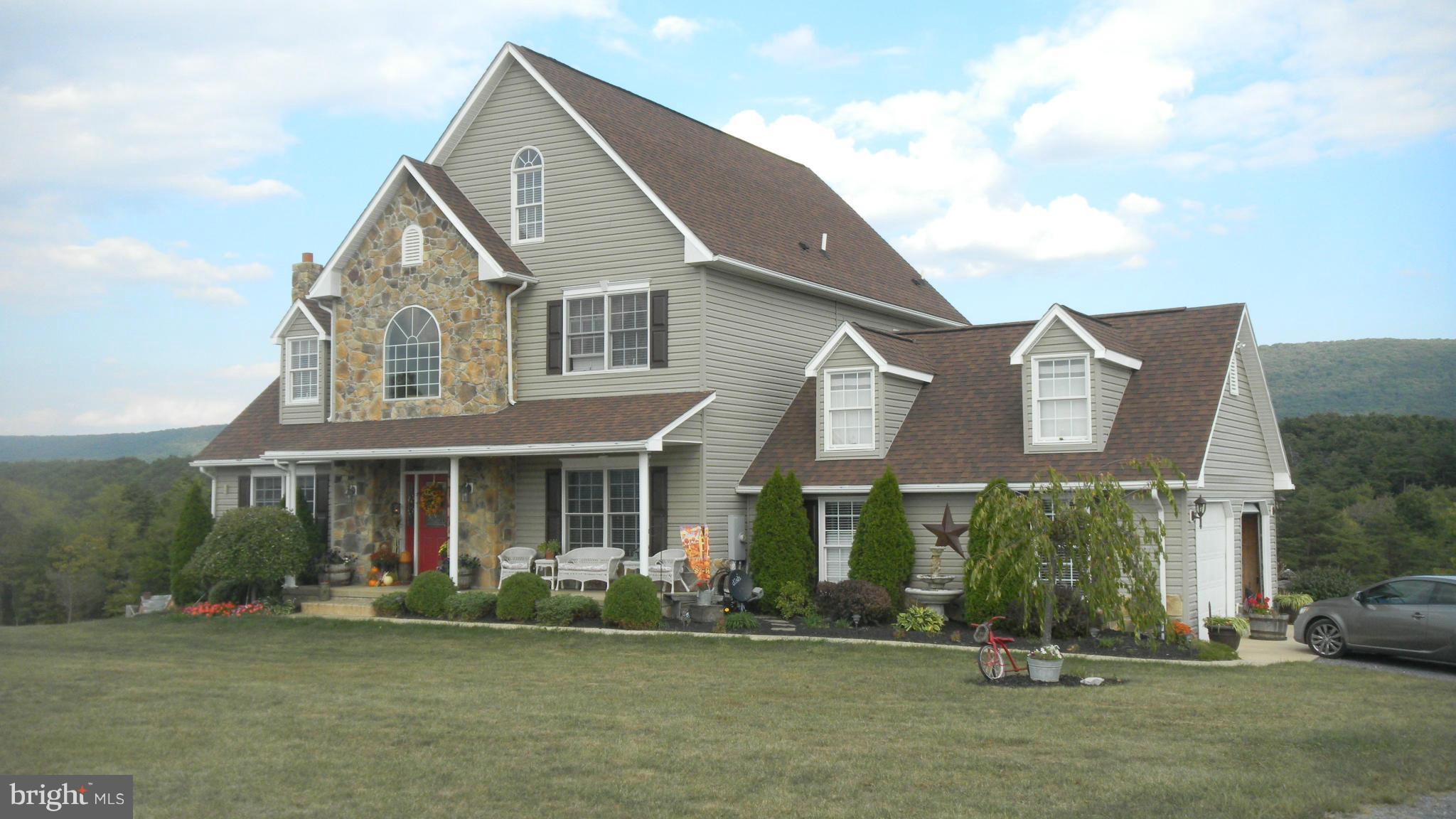 10455 Winchester Grade Road Berkeley Springs, WV 25411 - Photo 1 of 13 Front view of home