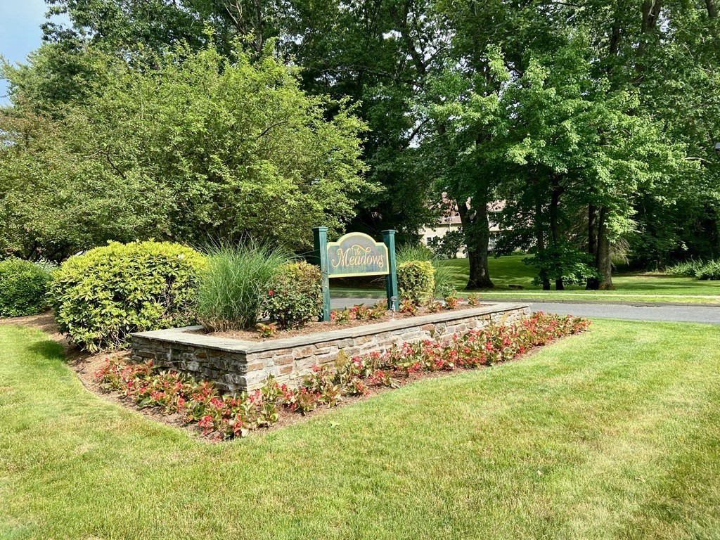 149 The Meadows, Unit 149 Enfield, CT 06082 - Photo 14 of 14 a view of a garden with a fountain