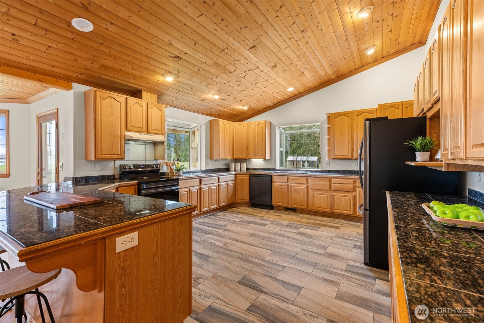 30608 40th Avenue South Roy, WA 98580 - Photo 11 of 40 a kitchen with sink a counter top space and appliances