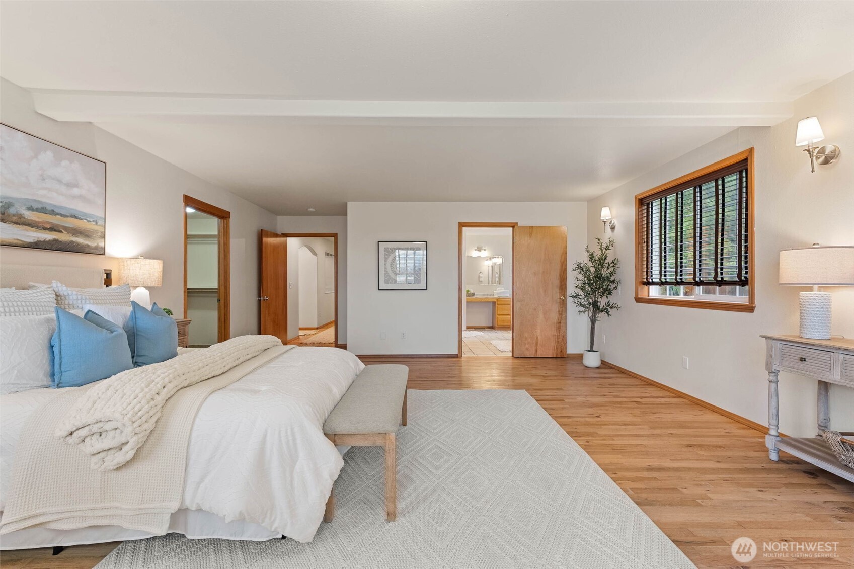 30608 40th Avenue South Roy, WA 98580 - Photo 17 of 40 a spacious bedroom with a large bed and a window