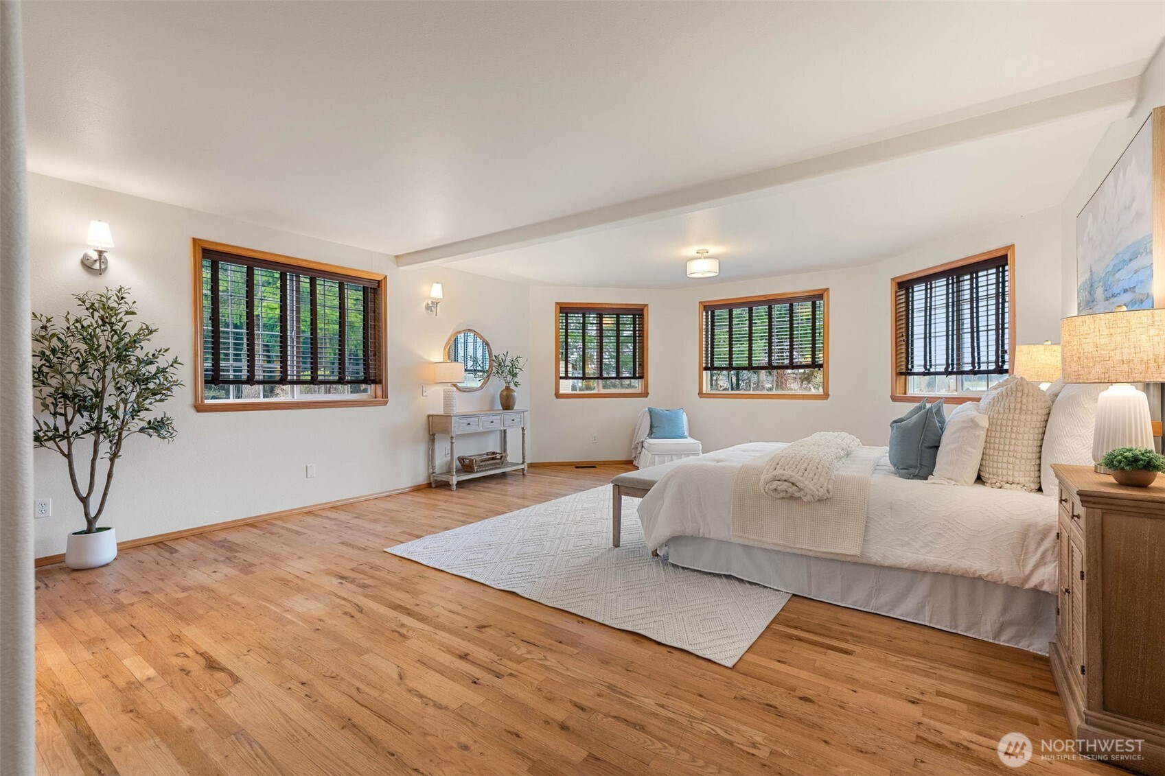 30608 40th Avenue South Roy, WA 98580 - Photo 18 of 40 a spacious bedroom with a large bed and a window