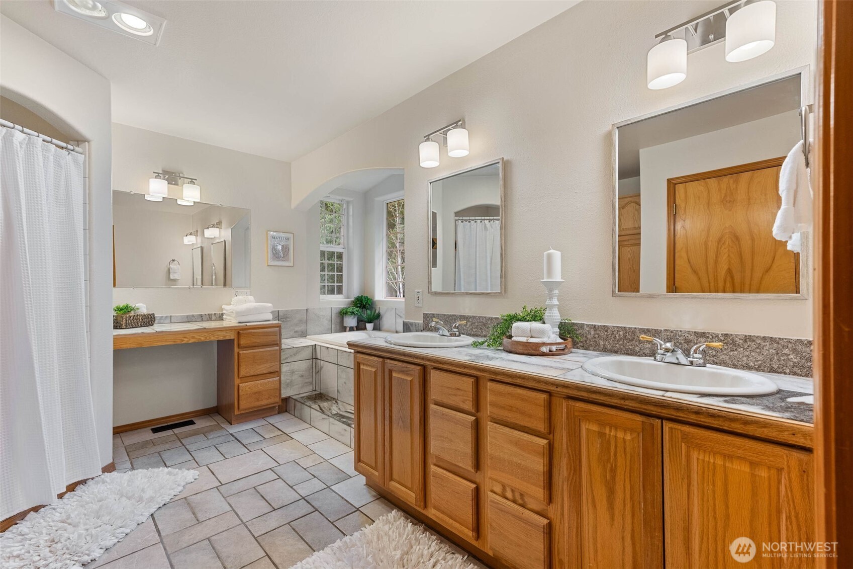 30608 40th Avenue South Roy, WA 98580 - Photo 19 of 40 a bathroom with a granite countertop sink mirror and a