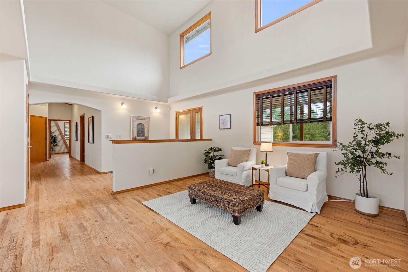 30608 40th Avenue South Roy, WA 98580 - Photo 2 of 40 a living room with furniture and a potted plant
