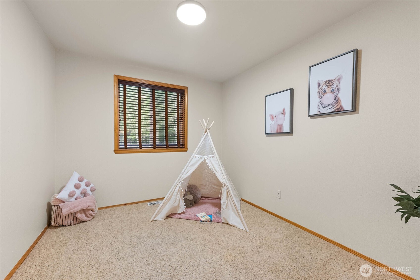 30608 40th Avenue South Roy, WA 98580 - Photo 23 of 40 a room with gym equipment and a window