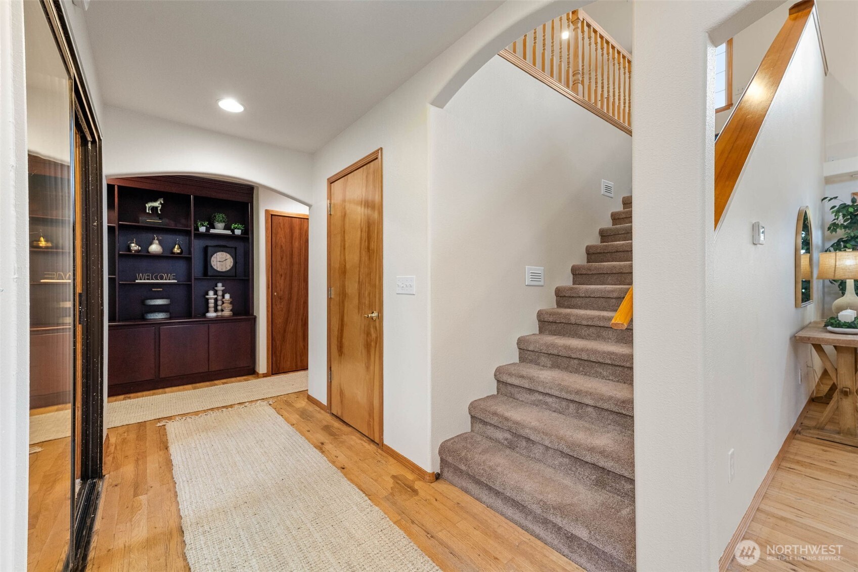 30608 40th Avenue South Roy, WA 98580 - Photo 27 of 40 a view of a hallway with wooden floor and staircase
