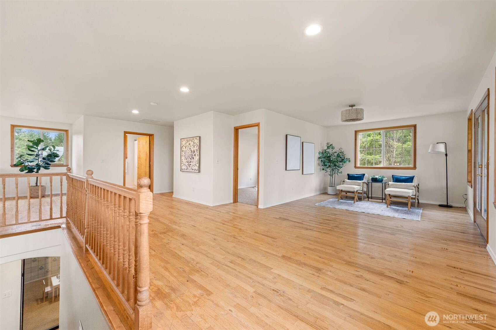 30608 40th Avenue South Roy, WA 98580 - Photo 28 of 40 a view of a livingroom with wooden floor and furniture