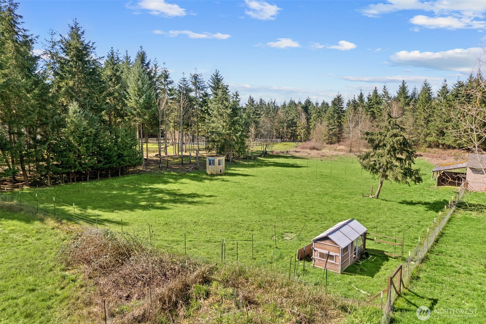 30608 40th Avenue South Roy, WA 98580 - Photo 35 of 40 a backyard of a house with table and chairs