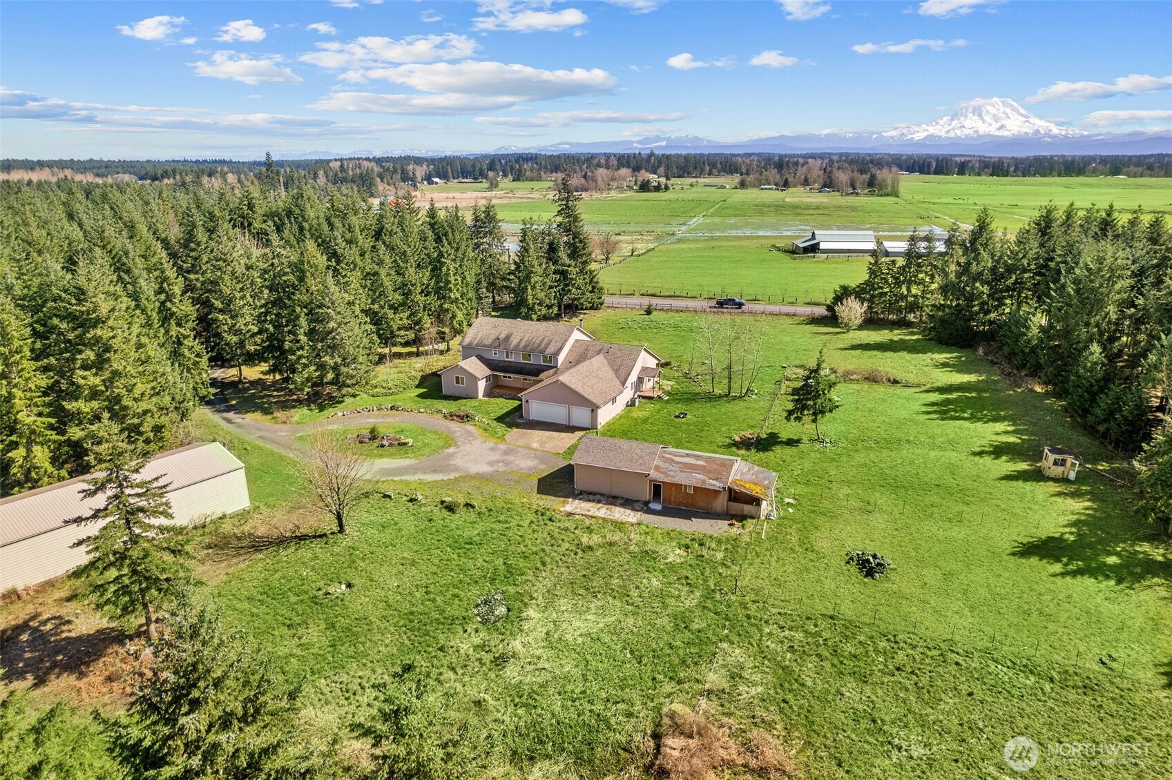 30608 40th Avenue South Roy, WA 98580 - Photo 36 of 40 a view of a garden with an outdoor seating