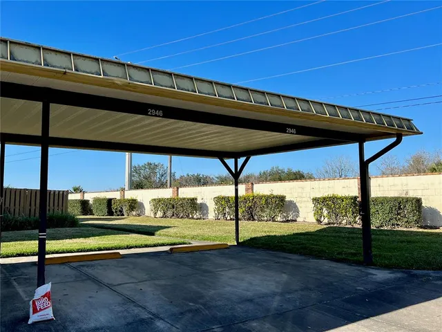 a view of backyard with green space