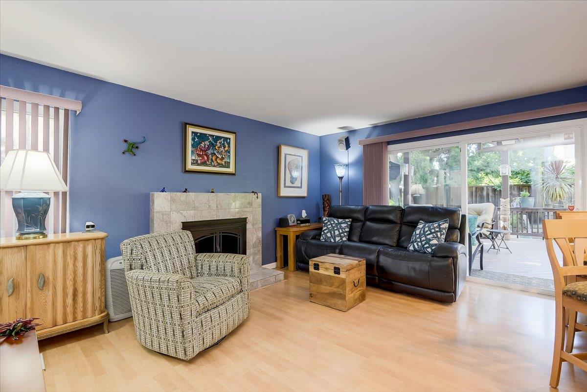 1635 Serpa Drive Milpitas, CA 95035 - Photo 14 of 31 a living room with furniture and a fireplace