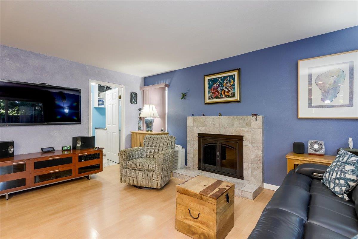 1635 Serpa Drive Milpitas, CA 95035 - Photo 15 of 31 a living room with furniture and a fireplace