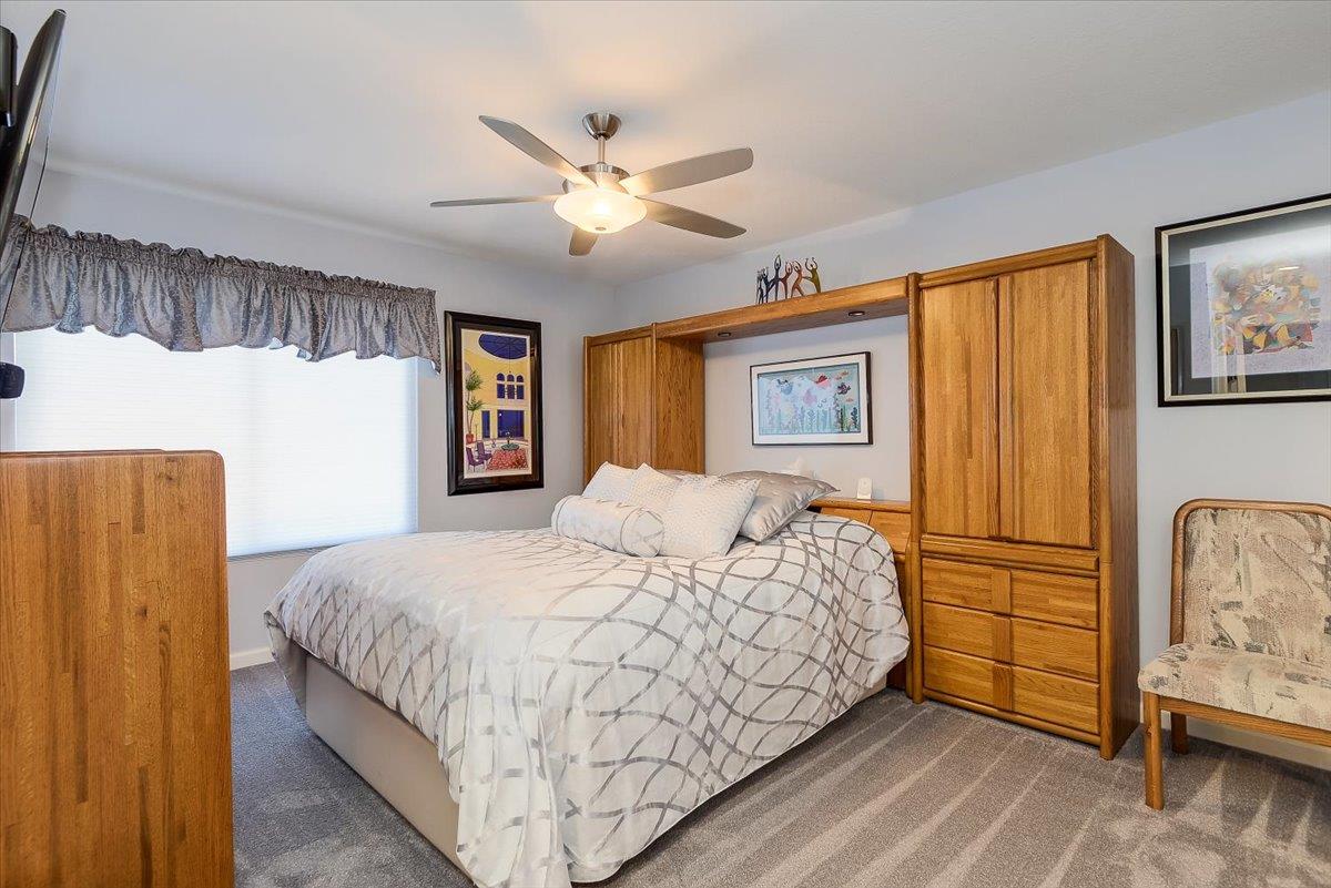 1635 Serpa Drive Milpitas, CA 95035 - Photo 18 of 31 a bedroom with a bed and a large mirror on the dresser