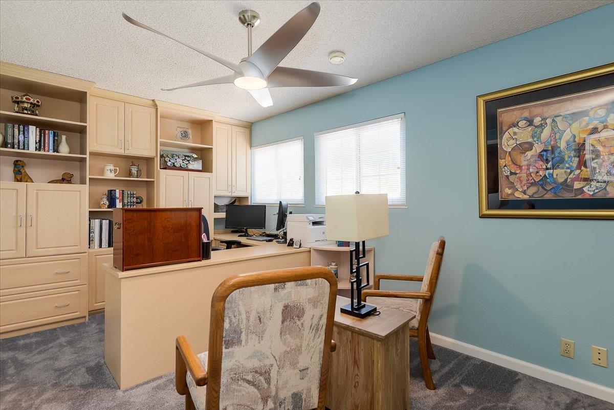 1635 Serpa Drive Milpitas, CA 95035 - Photo 21 of 31 a view of a workspace with furniture and a window