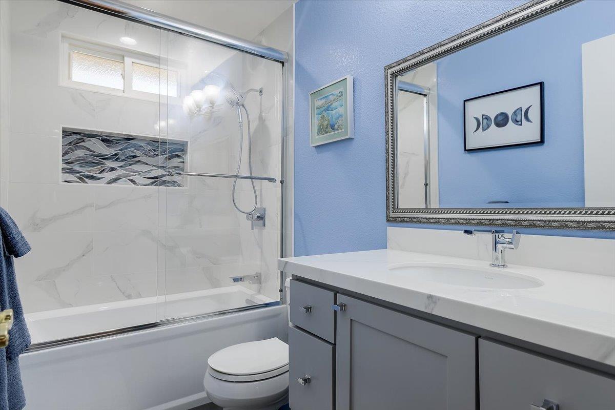 1635 Serpa Drive Milpitas, CA 95035 - Photo 23 of 31 a bathroom with a sink a toilet and shower