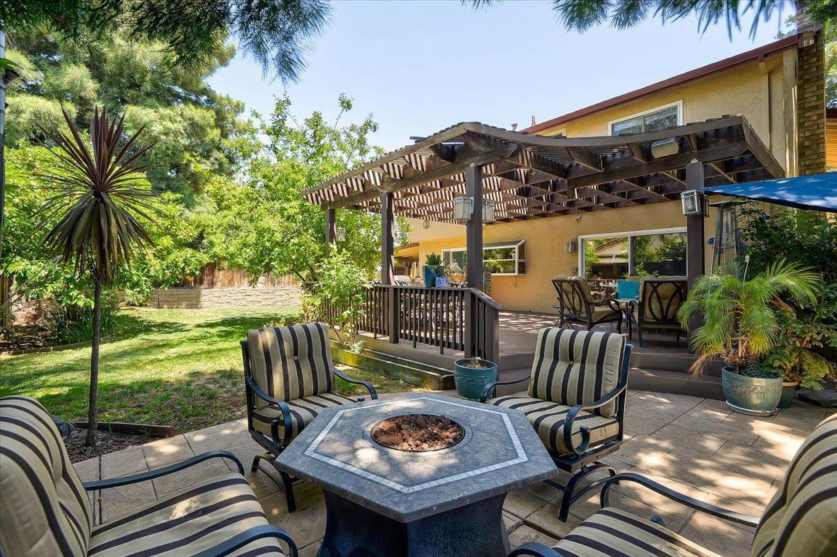 1635 Serpa Drive Milpitas, CA 95035 - Photo 25 of 31 a view of a patio with couches table and chairs and potted plants