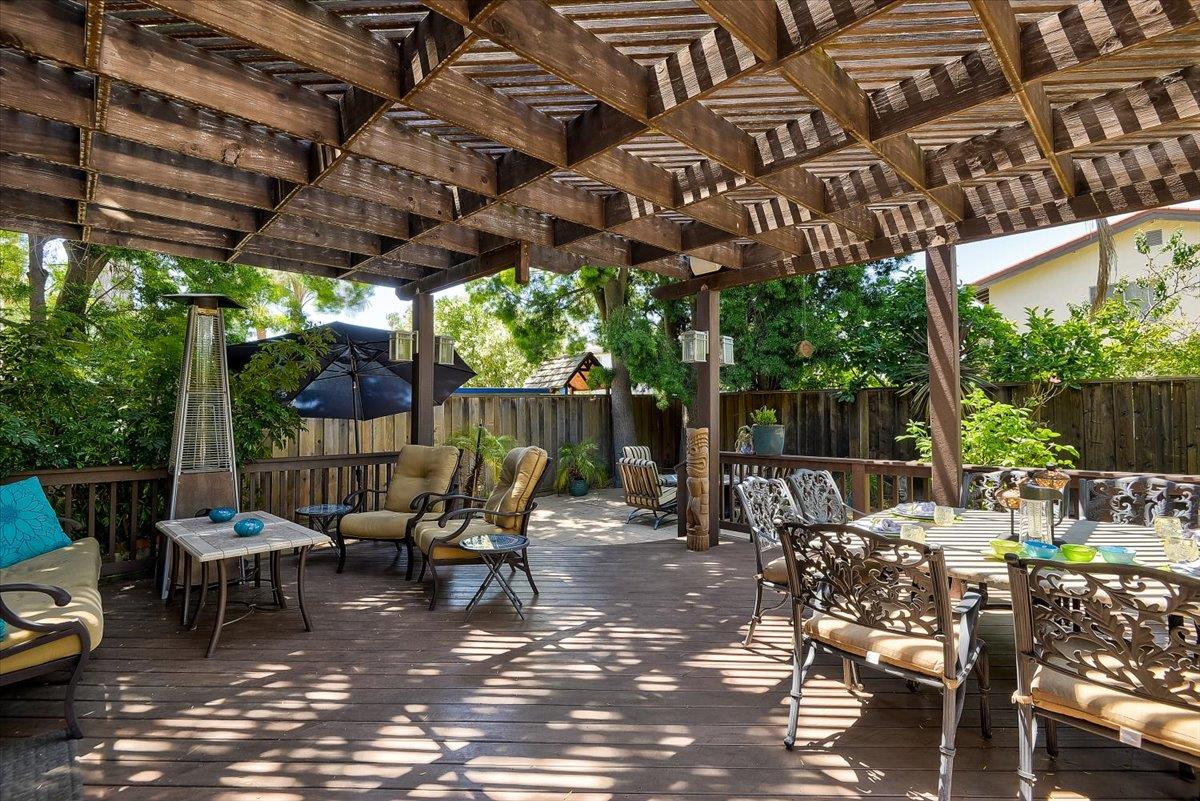 1635 Serpa Drive Milpitas, CA 95035 - Photo 28 of 31 a view of a patio with a dining table and chairs with wooden floor