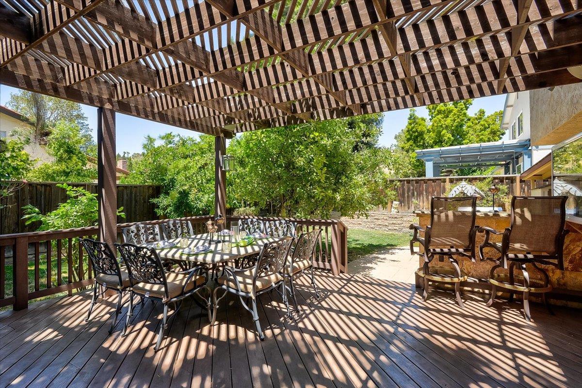 1635 Serpa Drive Milpitas, CA 95035 - Photo 29 of 31 a view of a patio with a table chairs and a potted plant