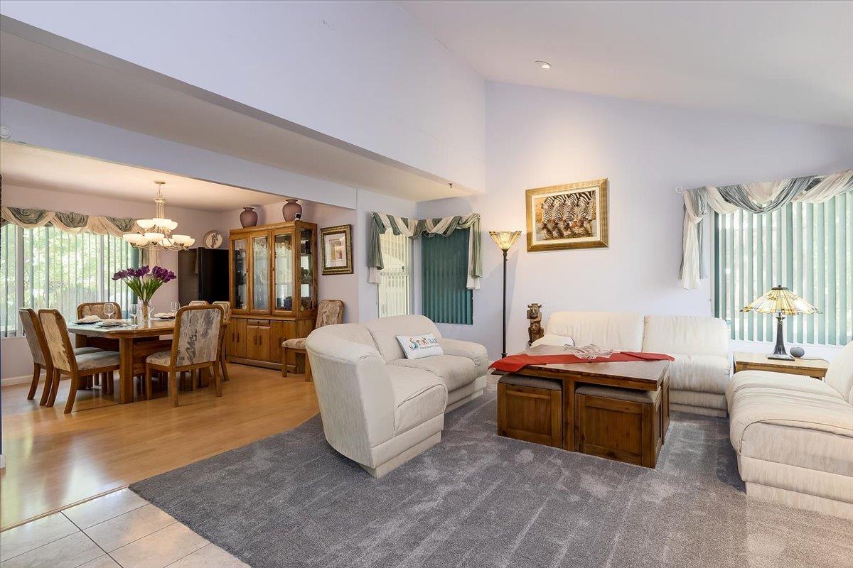 1635 Serpa Drive Milpitas, CA 95035 - Photo 6 of 31 a living room with furniture a window and a table