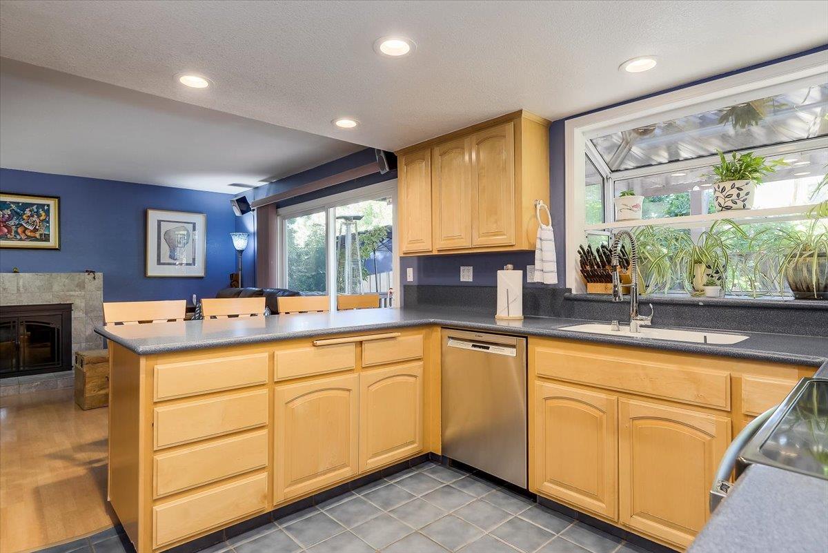 1635 Serpa Drive Milpitas, CA 95035 - Photo 9 of 31 a kitchen with sink cabinets and window