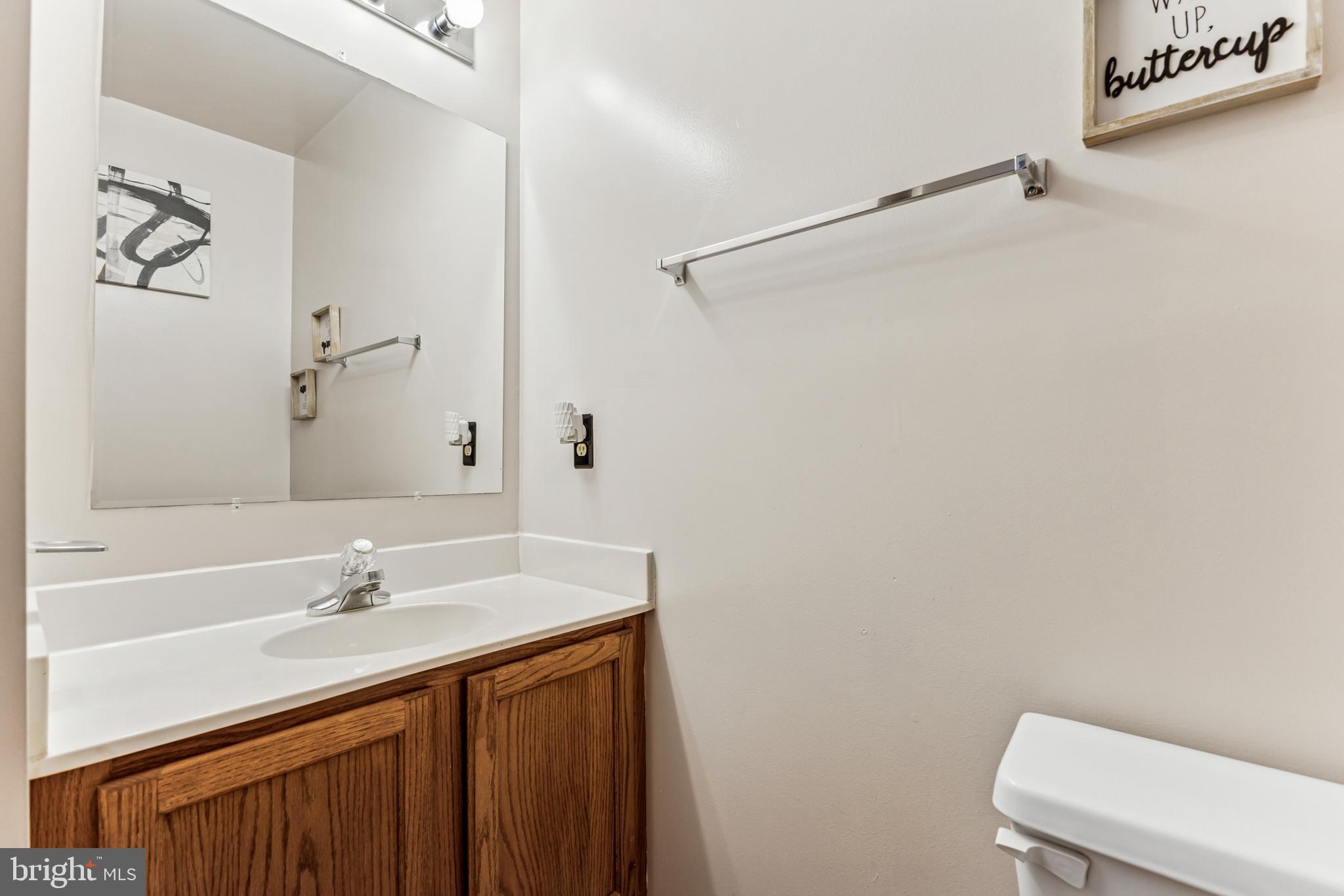 207 Wimbeldon Court, Unit 210 Stafford, VA 22556 - Photo 25 of 38 Main level half bath