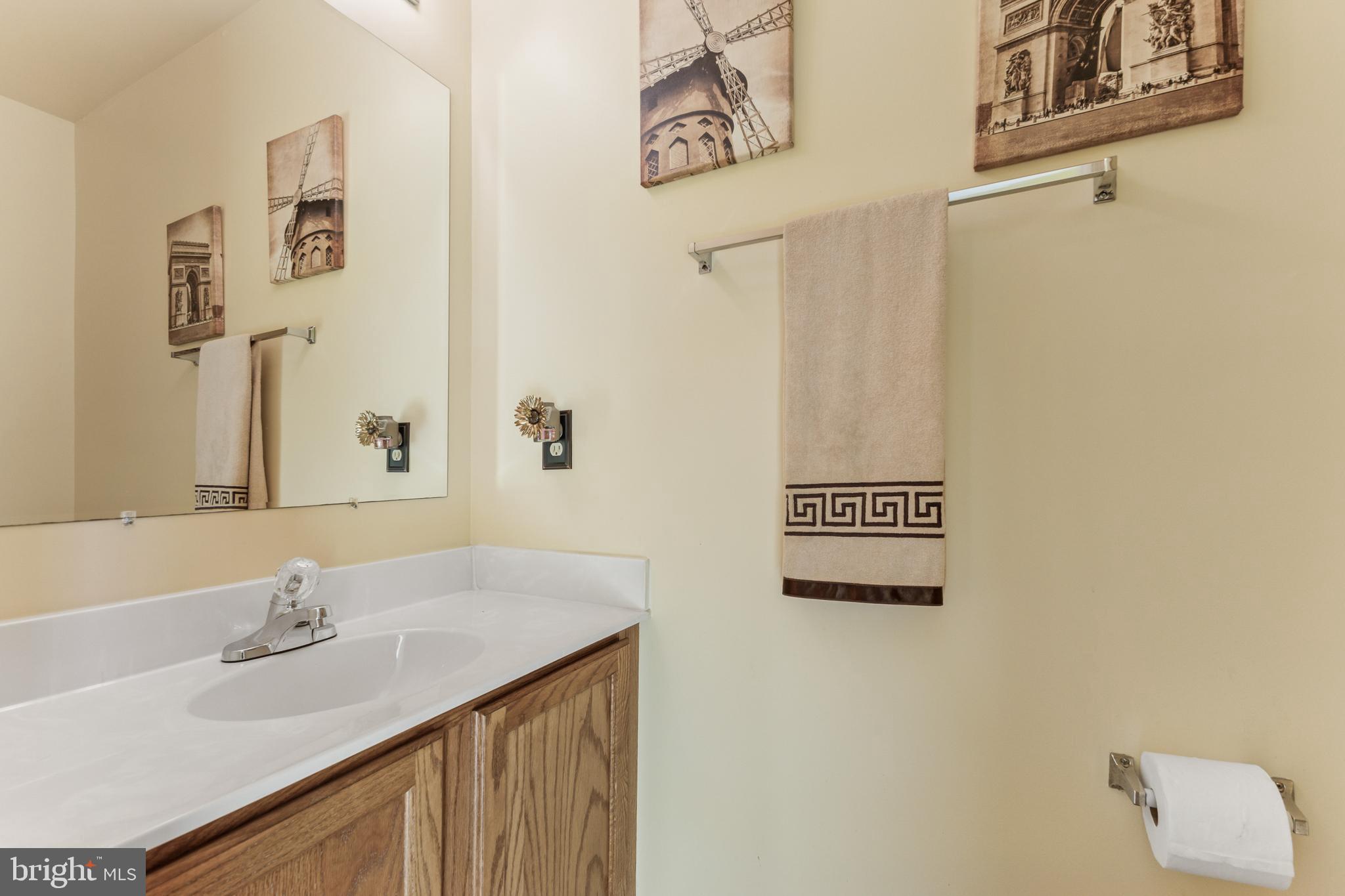 207 Wimbeldon Court, Unit 210 Stafford, VA 22556 - Photo 7 of 38 Bottom level half bath