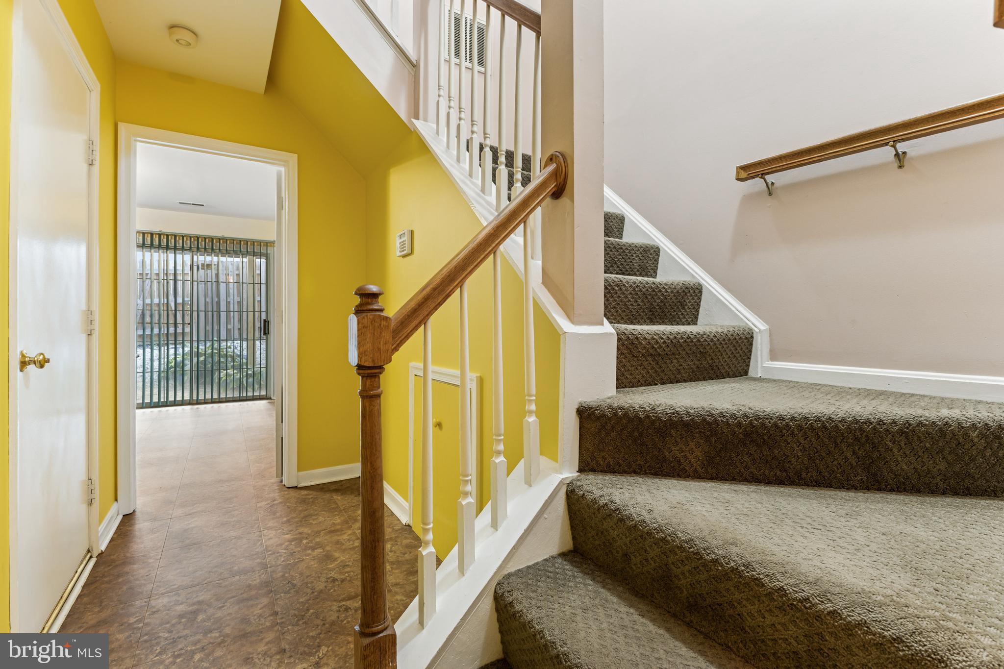 207 Wimbeldon Court, Unit 210 Stafford, VA 22556 - Photo 8 of 38 Heading up to the main level