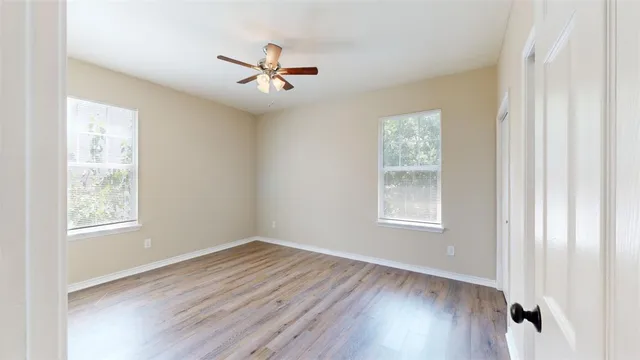a bathroom with a tub and a sink