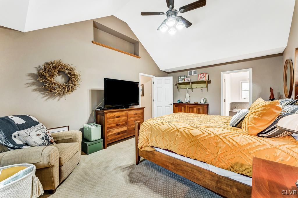 131 Blackstone Drive Wind Gap, PA 18091 - Photo 34 of 50 a bedroom with a bed and flat screen tv