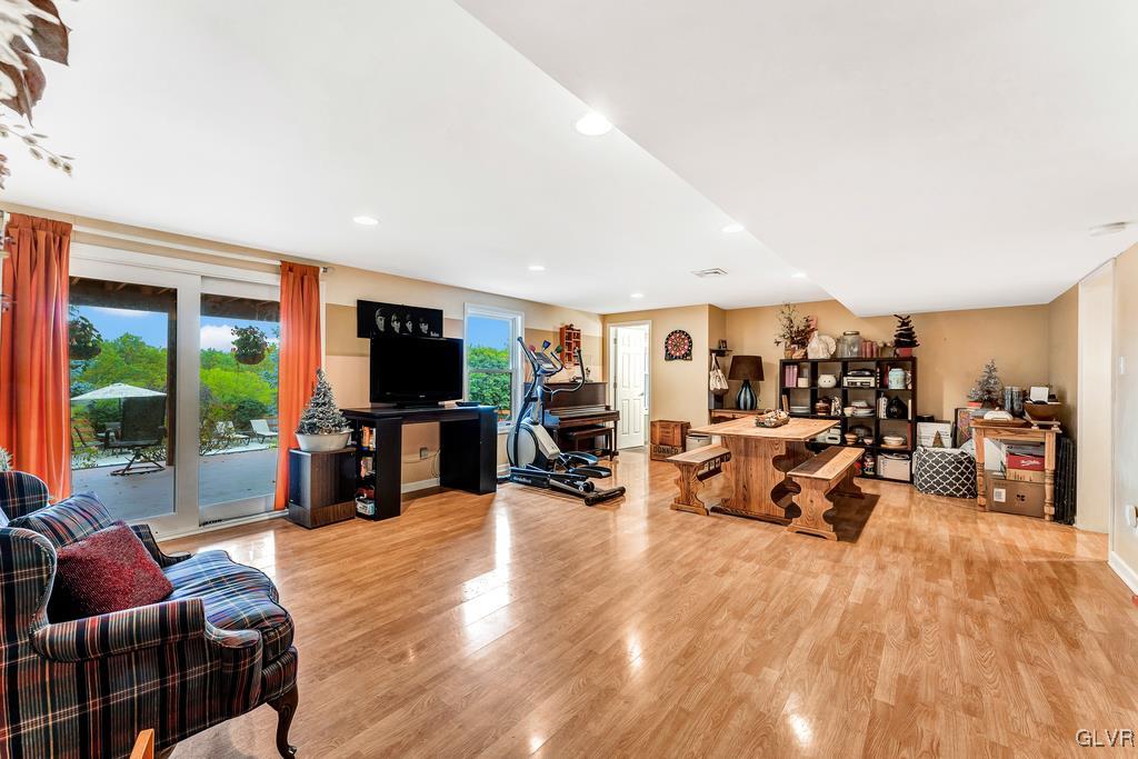 131 Blackstone Drive Wind Gap, PA 18091 - Photo 39 of 50 a living room with furniture and a flat screen tv