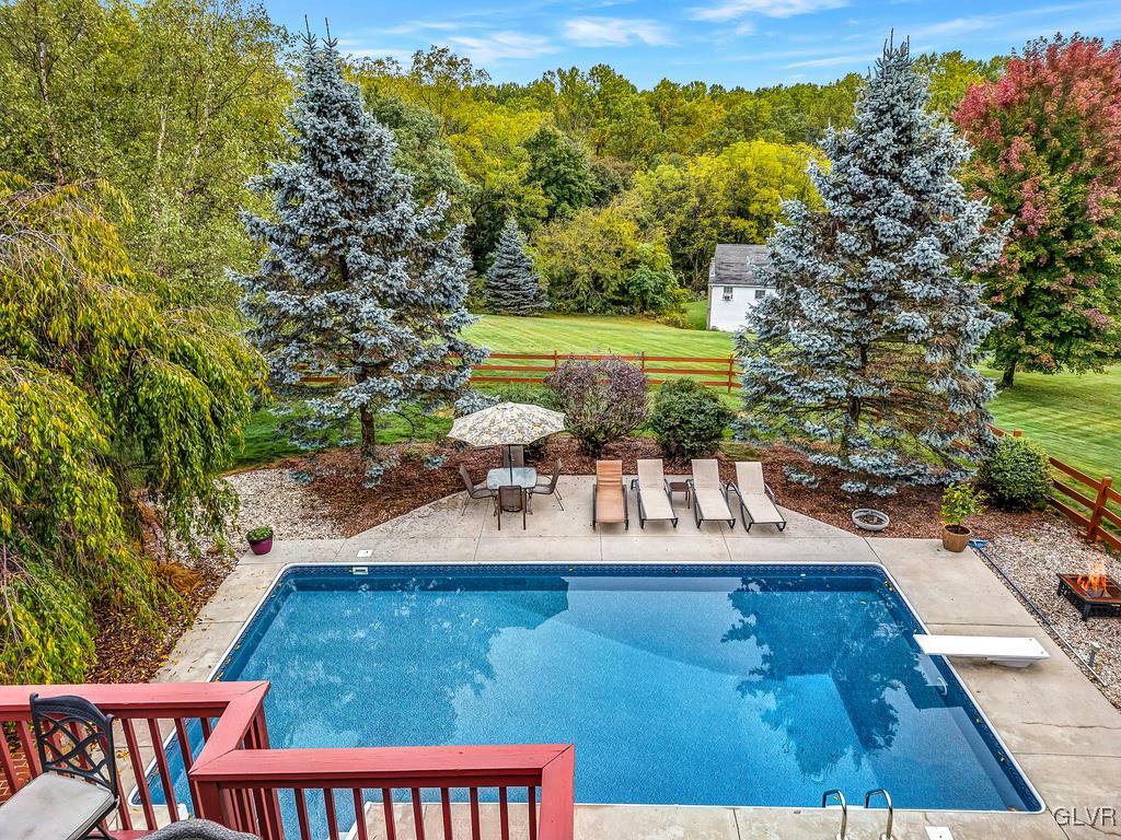 131 Blackstone Drive Wind Gap, PA 18091 - Photo 46 of 50 a view of a yard with chairs